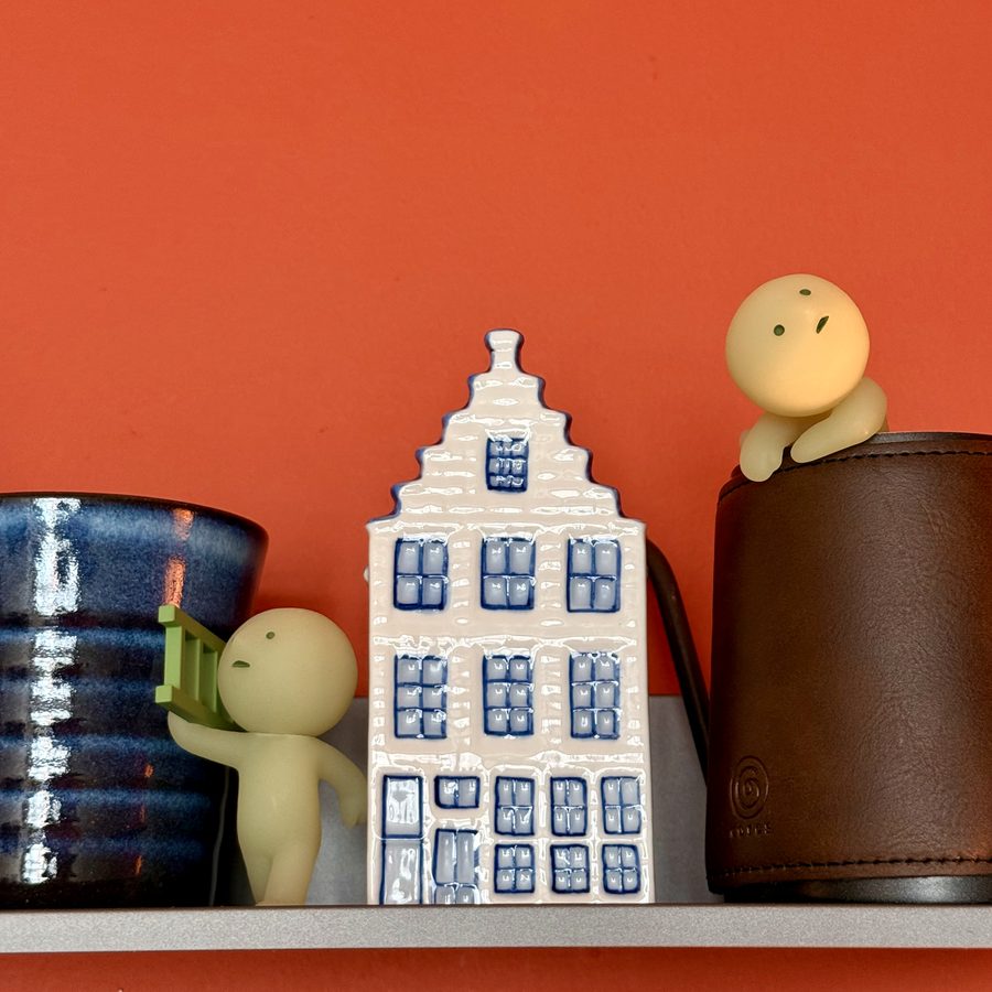 Small ceramic souvenirs collected from trips